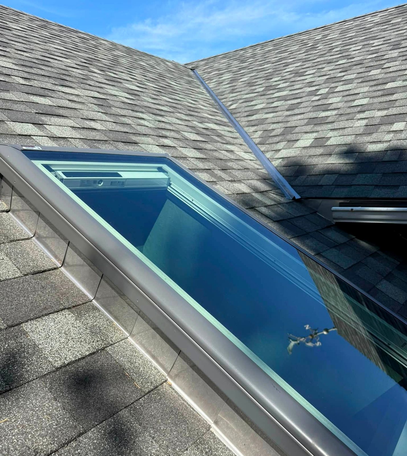 Pacific Peaks Roofing project: skylight set and flashed watertight